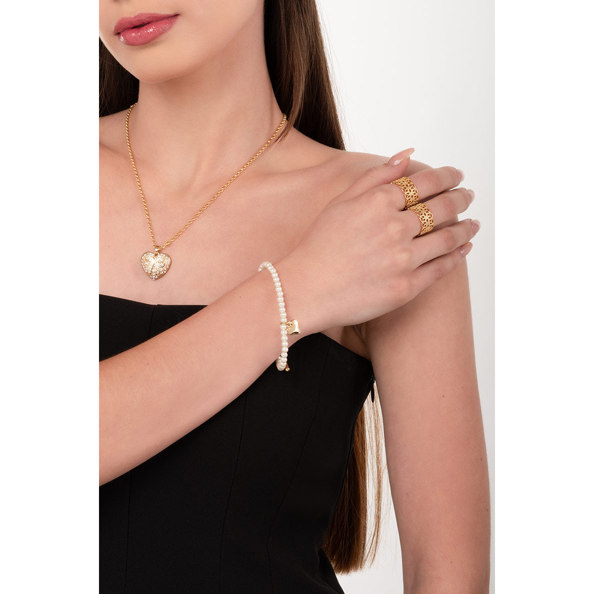 Pulsera perlas en baño de oro diseño corazón tono crema
