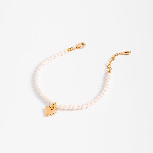 Pulsera perlas en baño de oro diseño corazón tono crema